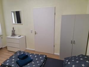 Ένα ή περισσότερα κρεβάτια σε δωμάτιο στο Apartment Kaffeeklatsch