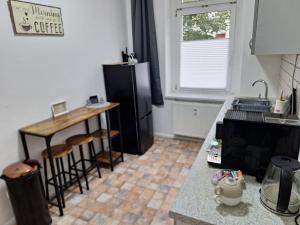 Η κουζίνα ή μικρή κουζίνα στο Apartment Kaffeeklatsch