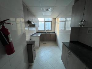 Η κουζίνα ή μικρή κουζίνα στο برج روان +5 φωτογραφίες