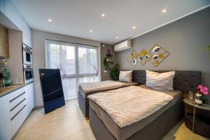 Ένα ή περισσότερα κρεβάτια σε δωμάτιο στο Villa-Harmonie Dresden