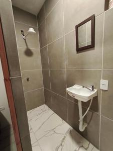 Ένα μπάνιο στο Suíte Natal Luz