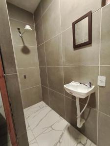 Ένα μπάνιο στο Suíte Natal Luz