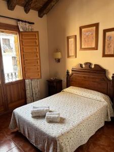 Postel nebo postele na pokoji v ubytování La Ontina Alojamientos Rurales