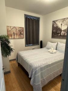 Ένα ή περισσότερα κρεβάτια σε δωμάτιο στο Suitestay Apartments Hotel