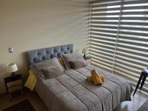 Ένα ή περισσότερα κρεβάτια σε δωμάτιο στο Departamento 1510 CENTRO TEMUCO