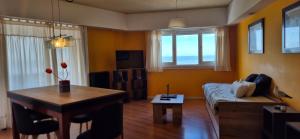 TV a/nebo společenská místnost v ubytování COSTANERA MAR DE AJO