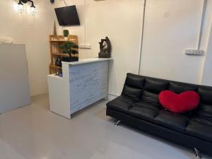 Sjónvarps- og/eða afþreyingartæki á LimeTree Loft Guesthouse +15 myndir