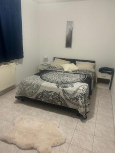 Ένα ή περισσότερα κρεβάτια σε δωμάτιο στο Ady