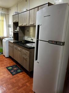 Kuchyň nebo kuchyňský kout v ubytování Apartamento 301 próximo as Termas