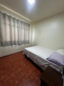 Postel nebo postele na pokoji v ubytování Apartamento 301 próximo as Termas + 5 fotografií