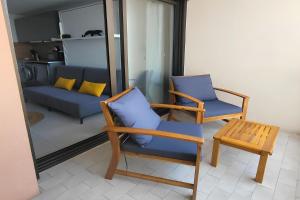 Posezení v ubytování Ginkgo Studio - piscine, proche de la mer, Golf, WIFI