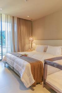 Postel nebo postele na pokoji v ubytování Eagle Boutique Hotel