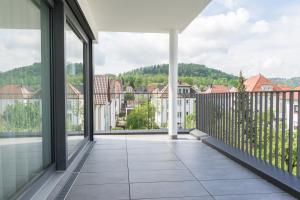 a balcony with a view of a city at L19 Tuttlingen in Tuttlingen