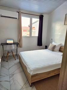 Postel nebo postele na pokoji v ubytování Maison Zoé