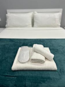 Ένα ή περισσότερα κρεβάτια σε δωμάτιο στο AB apartment Pistoia