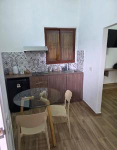 Η κουζίνα ή μικρή κουζίνα στο La Maison San LaZaro +5 φωτογραφίες