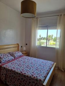 Una cama o camas en una habitación de Cosy studio And Tidy Apartment