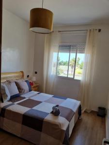 Una cama o camas en una habitación de Cosy studio And Tidy Apartment