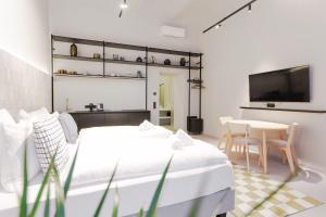 TV/trung tâm giải trí tại The Old Shops - Boutique Design Studios near Karlsplatz