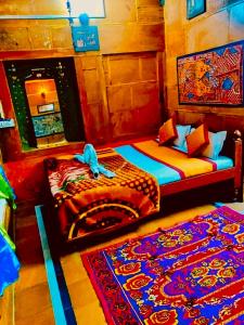 Ένα ή περισσότερα κρεβάτια σε δωμάτιο στο Magical Guest house jaisalmer
