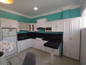 Kuchyň nebo kuchyňský kout v ubytování Suite in Quevedo - Comfort and safety