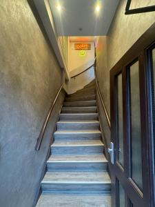 a staircase in a building with blue steps at Suite-Pauli in Hamburg +178 photos