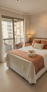 En eller flere senge i et værelse på Studio próx metrô Oscar Freire