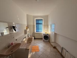 Χώρος καθιστικού στο Ferienwohnung Goldener Drache