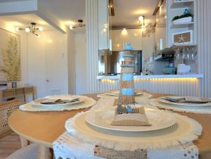 a table with a lighthouse toy on top of it at Marina Views & Island Adventures: Fajardo Condo with Pool in Beltran