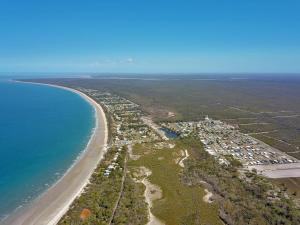 an aerial view of a beach and the ocean at 58 The Esplanade in Woodgate