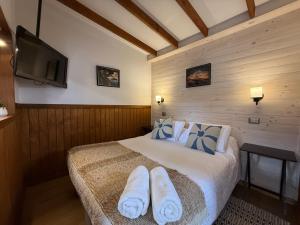 Ένα ή περισσότερα κρεβάτια σε δωμάτιο στο Departamentos de turismo - Apart Hotel MiCasa