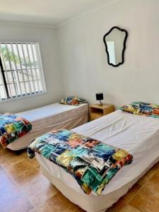 Postel nebo postele na pokoji v ubytování 71 The Esplanade