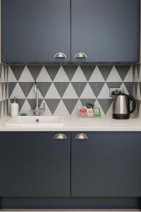 Η κουζίνα ή μικρή κουζίνα στο 343 Luxury in Caledonian Central London