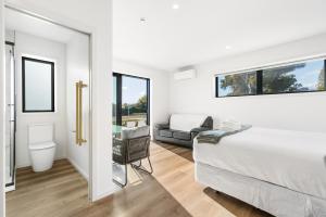 Ένα ή περισσότερα κρεβάτια σε δωμάτιο στο New Contemporary Studio Escape