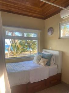 Postel nebo postele na pokoji v ubytování Tu Casa at The Lodge at Long Bay