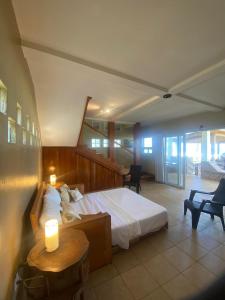 Postel nebo postele na pokoji v ubytování Tu Casa at The Lodge at Long Bay