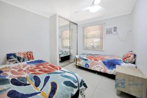 Postel nebo postele na pokoji v ubytování 154 The Esplanade