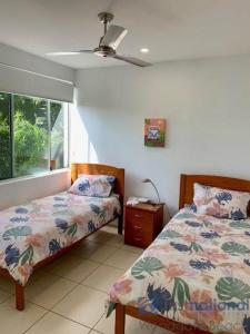 Postel nebo postele na pokoji v ubytování 4/139 The Esplanade