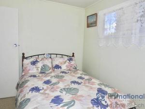 Giường trong phòng chung tại 25 Walkers Point Esplanade