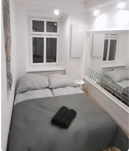 Postel nebo postele na pokoji v ubytování Apartament Antracyt