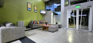 Χώρος καθιστικού στο Hotel Puerta del Sol