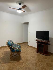 TV a/nebo společenská místnost v ubytování Casa aconchegante