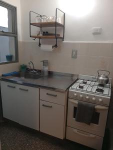 Η κουζίνα ή μικρή κουζίνα στο PABLO`S departamento