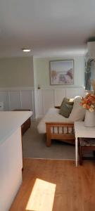 Ένα ή περισσότερα κρεβάτια σε δωμάτιο στο Green on Queen