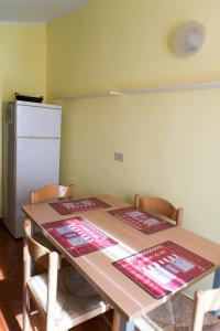 Kuchyň nebo kuchyňský kout v ubytování Al Cardinale Rooms & Studios