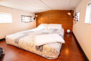 Voodi või voodid majutusasutuse WeeCasa Tiny Home Resort toas