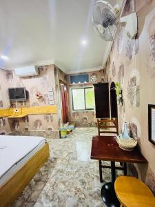 Kuchyň nebo kuchyňský kout v ubytování Por Chey Hotel