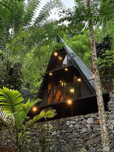 a tree house in the middle of a forest at Pepper Trails Riverstone 
