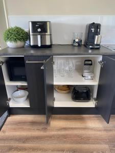 Η κουζίνα ή μικρή κουζίνα στο Ooh la la Accomodation, a little luxury