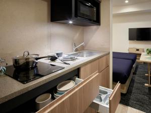 Kuchyň nebo kuchyňský kout v ubytování Minn Kasai